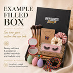 Surprise & Shine custom gift box filled with makeup brushes, mirror, makeup sponges, false lashes, butterfly necklace, scrunchies, and a bamboo toothbrush.