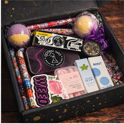 Surprise & Shine Snoop Box with rolling papers, stickers, bath bombs, and mints.